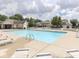 Community pool with lounge chairs and plenty of space for relaxing and soaking up the sun at 8415 Alcona Dr, Indianapolis, IN 46237