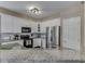 This kitchen features white cabinets, stainless appliances, and stylish countertops at 8415 Alcona Dr, Indianapolis, IN 46237