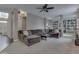 Spacious living room features plush seating, built-in shelves, and an open layout at 8415 Alcona Dr, Indianapolis, IN 46237