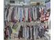 Organized walk-in closet features double rods and shelving at 8415 Alcona Dr, Indianapolis, IN 46237