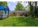 Large back yard offers space to play, entertain, and enjoy the outdoors at 8540 E 37Th Pl, Indianapolis, IN 46226