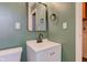 Bathroom features a modern vanity and decor at 8540 E 37Th Pl, Indianapolis, IN 46226