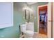 Updated bathroom features modern fixtures, vanity, and decorative mirror at 8540 E 37Th Pl, Indianapolis, IN 46226