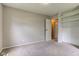 Bedroom with carpet and closet organizer at 8540 E 37Th Pl, Indianapolis, IN 46226