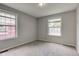 Bright bedroom with neutral paint and carpeted floors at 8540 E 37Th Pl, Indianapolis, IN 46226