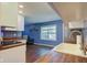 Modern kitchen with stylish backsplash, butcher block countertops and hardwood flooring at 8540 E 37Th Pl, Indianapolis, IN 46226