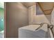 Laundry room featuring a white washer and gray walls at 8540 E 37Th Pl, Indianapolis, IN 46226