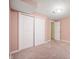 Bedroom features neutral carpet flooring, closet, and pastel painted walls, creating a cozy and inviting space at 8578 Nolan Dr, Fishers, IN 46038