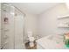 Bright bathroom features a walk-in shower, granite countertop, and modern fixtures at 901 N Greenbriar Rd, Muncie, IN 47304