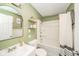 Bathroom featuring a tub/shower, single sink vanity, and neutral walls at 901 N Greenbriar Rd, Muncie, IN 47304