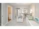 Spacious bedroom designed as Bedroom with crib, seating, and mirrored closet doors at 901 N Greenbriar Rd, Muncie, IN 47304