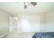 Bedroom features a closet with louvered doors, soft carpet, and a neutral color palette at 901 N Greenbriar Rd, Muncie, IN 47304