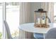 Close up of dining room table featuring centerpiece with natural light in background at 901 N Greenbriar Rd, Muncie, IN 47304
