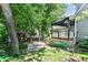 A backyard featuring a shed, a patio, and a raised deck with a pergola at 908 Queensbury Dr, Noblesville, IN 46062