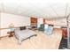 Spacious basement with fireplace, carpeted floors, and a bar area, perfect for entertaining at 908 Queensbury Dr, Noblesville, IN 46062