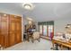 Bedroom featuring a window, built-in closet, and comfortable seating at 908 Queensbury Dr, Noblesville, IN 46062