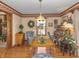 Traditional office features a wooden table, secretary desk and charming decor with hardwood flooring at 908 Queensbury Dr, Noblesville, IN 46062