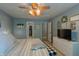 Bedroom with neutral colors, ceiling fan, and closet with open doorway at 939 Arabian Way, Bargersville, IN 46106
