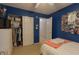 Blue bedroom featuring a ceiling fan, closet, and decor at 939 Arabian Way, Bargersville, IN 46106
