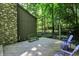 Exterior deck with outdoor seating, mature trees, and serene outdoor setting at 944 Briar Patch Ln, Greenwood, IN 46142