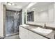 Bathroom featuring a double sink with granite countertop and a glass shower at 944 Briar Patch Ln, Greenwood, IN 46142