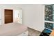 Bedroom featuring a large window and a built-in bookcase at 944 Briar Patch Ln, Greenwood, IN 46142