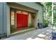 Welcoming front porch with a vibrant red double door, showcasing a stylish entrance to the home at 944 Briar Patch Ln, Greenwood, IN 46142
