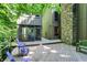Multi-level home with wooden deck, outdoor furniture, and a screened-in porch at 944 Briar Patch Ln, Greenwood, IN 46142