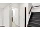 Hallway featuring access to the stairs and bathroom down the hall at 944 Briar Patch Ln, Greenwood, IN 46142
