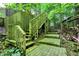 Stone and wooden steps lead to a forest view at 944 Briar Patch Ln, Greenwood, IN 46142