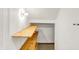 Hallway storage with built-in shelving, white walls, and neutral flooring at 944 Briar Patch Ln, Greenwood, IN 46142