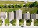 Overhead shot featuring symmetrical house rooftops, orderly lawns, and a neatly aligned suburban street at 951 Curlew Ln, Greenwood, IN 46143