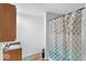 Bathroom featuring a shower with a decorative curtain and a vanity with modern fixtures at 951 Curlew Ln, Greenwood, IN 46143
