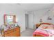 Bedroom with a dresser, a bed, and decorated walls at 951 Curlew Ln, Greenwood, IN 46143