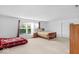 Large bedroom with two beds, a window, and natural light at 951 Curlew Ln, Greenwood, IN 46143