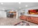 Open-concept space features a living room with an adjacent dining area and kitchen at 951 Curlew Ln, Greenwood, IN 46143