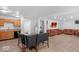 Open-concept living area with kitchen, dining, and entertainment spaces at 951 Curlew Ln, Greenwood, IN 46143