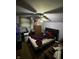 This is a cluttered bedroom with a mattress on a frame at 9550 N Delaware St, Indianapolis, IN 46240