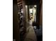 Hallway with access to storage rooms and natural light, offers practical layout at 9550 N Delaware St, Indianapolis, IN 46240