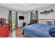 Cozy bedroom with hardwood floors and natural light at 10174 N County Road 471 E, Pittsboro, IN 46167