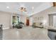 Bright and airy living room featuring hardwood floors, a cozy seating area, and ample natural light at 10174 N County Road 471 E, Pittsboro, IN 46167