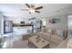 Open-concept living area with a modern kitchen and comfortable seating arrangement at 10751 Sheffield Ct, Fishers, IN 46038