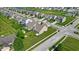 Aerial view of homes in the community with the water ponds and green trees at 10917 Hunter Lake Ln, Indianapolis, IN 46239