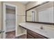 Well-lit bathroom vanity featuring a spacious countertop and a sleek mirror at 10917 Hunter Lake Ln, Indianapolis, IN 46239