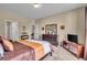 Spacious bedroom featuring neutral colors, a cozy carpet, and ample natural light at 10917 Hunter Lake Ln, Indianapolis, IN 46239