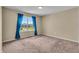 Neutral bedroom with large window and plush carpet at 10917 Hunter Lake Ln, Indianapolis, IN 46239