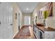 Welcoming foyer with hardwood floors, stylish decor, and a bright, airy atmosphere at 10917 Hunter Lake Ln, Indianapolis, IN 46239