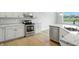Close-up of the kitchen area featuring modern stainless steel appliances and granite countertops, designed for functionality and style at 1127 Kay Dr, Greenwood, IN 46142