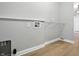 Functional laundry room features a washing machine hookup, an outlet, and wire shelving at 1127 Kay Dr, Greenwood, IN 46142