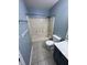 Compact bathroom showcasing a tiled shower-tub, toilet, and vanity with chrome fixtures at 1206 Brownswood Dr, Brownsburg, IN 46112